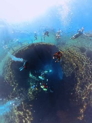 The Blue Hole, Malta If you’re a sports diver, the Blue Hole is truly a must do dive, a place where the underwater world feels almost otherworldly. This was Dive 7 of our Malta trip. 45 minutes with a maximum depth of 40.3 meters You begin by descending into the Blue Hole before slipping into a small cavern, where sunlight filters down from above, illuminating the water and surrounding rock. It’s a beautiful introduction to what lies ahead. From there, you venture out beneath where the famous Azure Window once stood, descending to around 40 metres. The arch may have fallen into the sea, but its giant remnants have created a spectacular underwater landscape, with huge blocks of rock forming natural passageways and swim-throughs. As you begin your ascent, you’ll pass through the chimney, where shafts of sunlight penetrate the depths like God’s fingers reaching down through the water, illuminating the blue around you. It’s one of those moments that makes you stop, look up and simply take it all in. Back inside the Blue Hole, you’ll complete your safety stop and any required decompression before making your final ascent. And as you break the surface, remember to watch out for the swimmers above. The Blue Hole isn’t just a dive, it’s an experience of light, rock, history and the sheer beauty of the underwater world. 🌊🤿 #bluehole #bsacdivers #scubadiving #malta #underwaterworld 