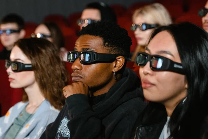A small theater of one hundred people, representing one hundred YouTube subscribers