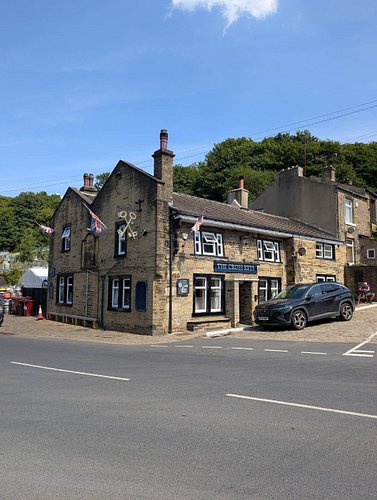 The Cross Keys in Siddal, Halifax is a proper 17th century tavern. Step past the bar and there's a charming snug that opens o...