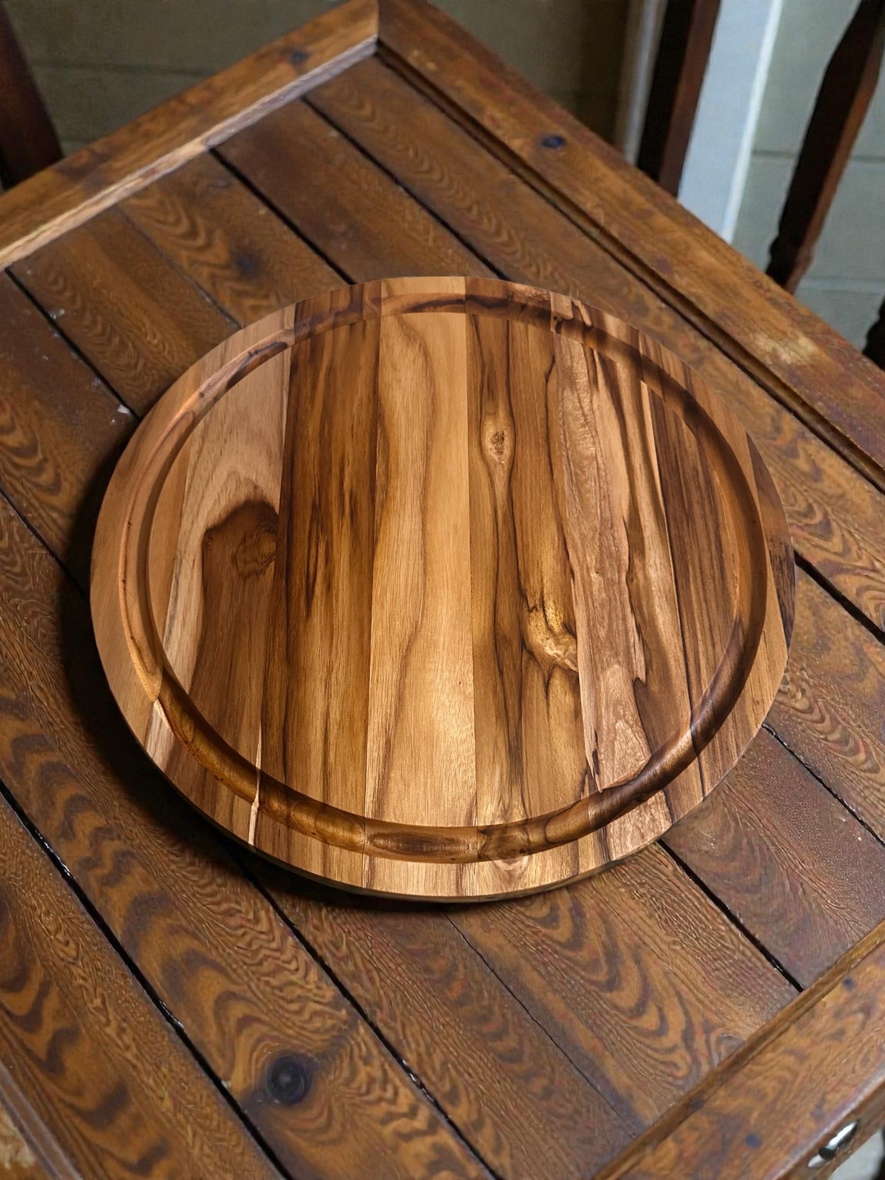 15” Round Solid Teak Cutting Board with Hand-Cut Juice Groove | Raised-Grain Finish | Food-Safe product image (1)