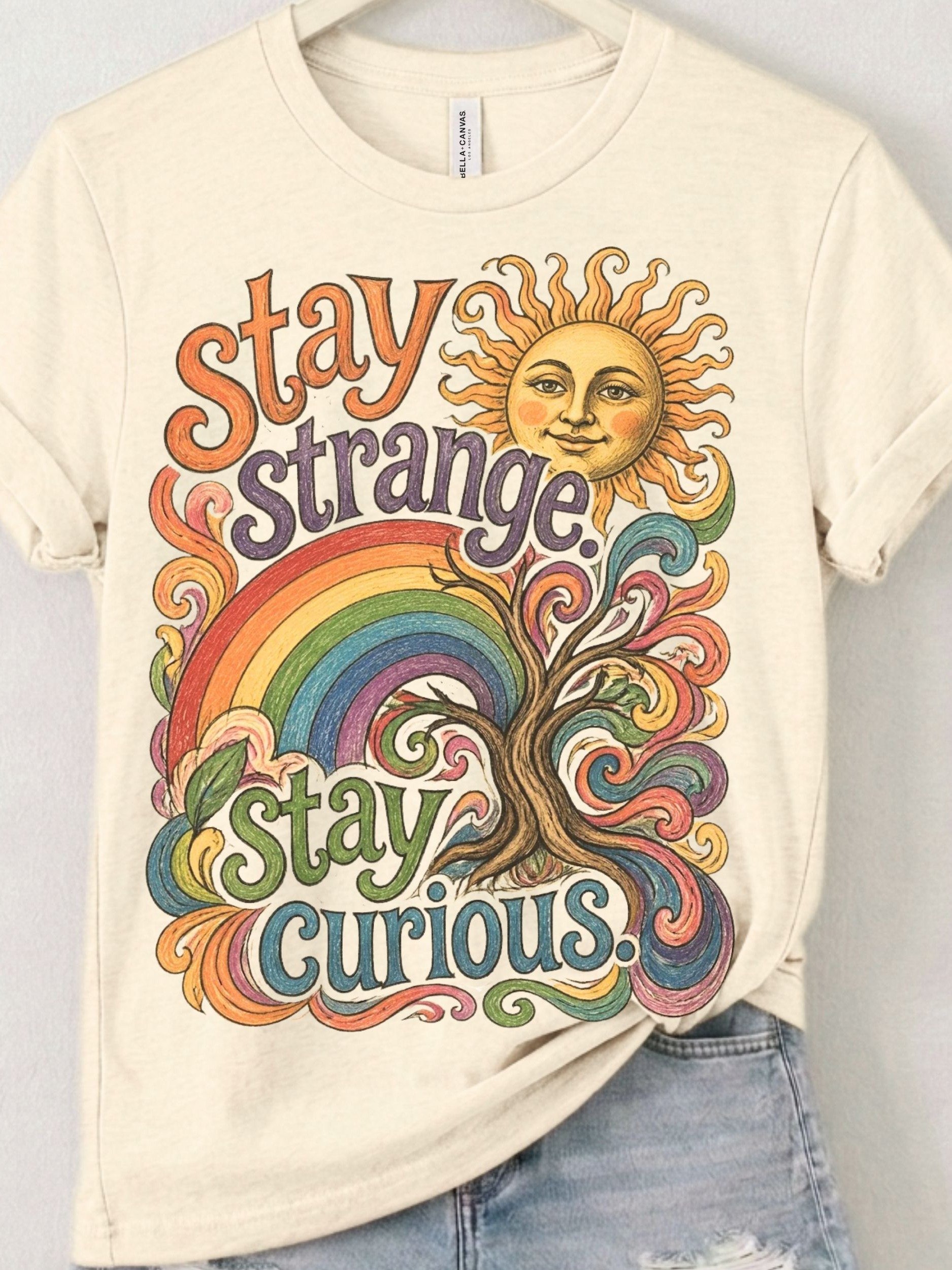 Stay Strange, Stay Curious Psychedelic Rainbow Tee product image (1)