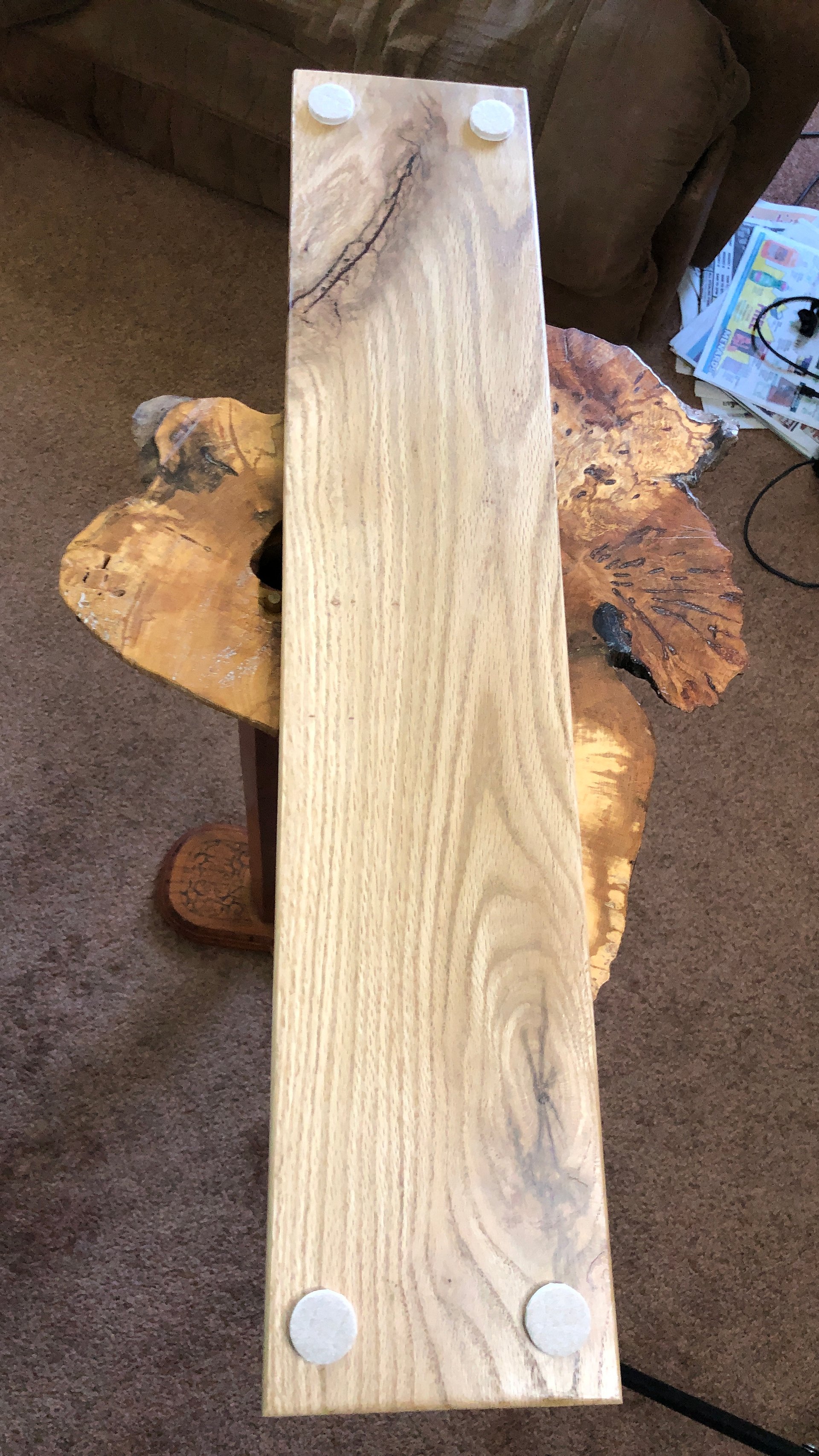 Knotty oak wood and wine red resin charcuterie board,cheese board, 5 1/2" x 27" x 5/8", with 4" twisted black handles. product image (3)