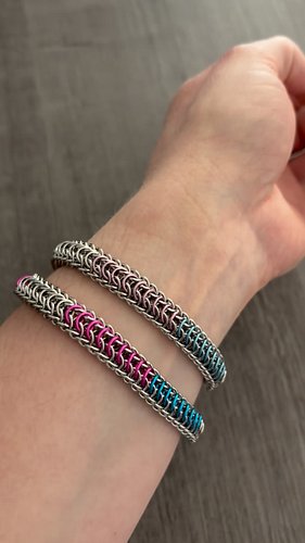 a new pride flag has arrived for the helios dragonscale bracelet design, the trans flag! there are two variations of neon and...