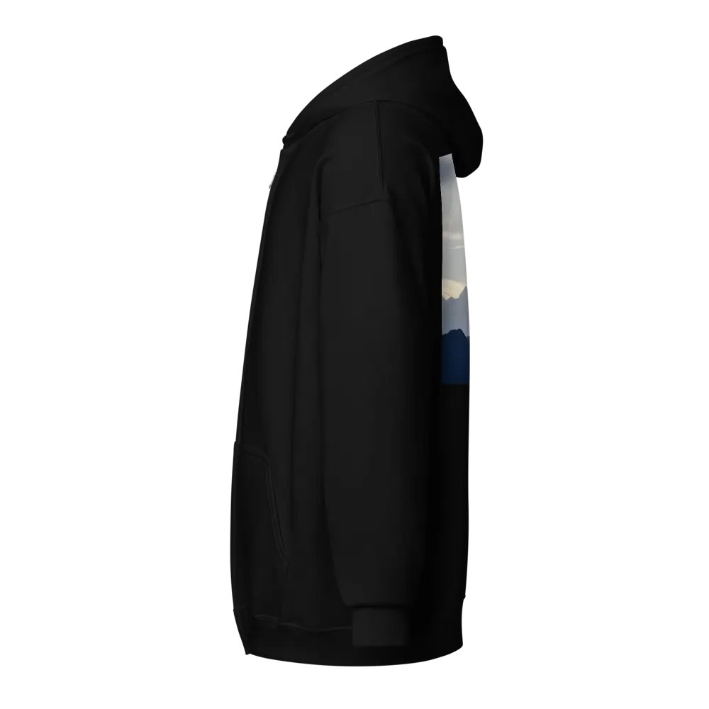 A cross standing against a serene landscape of rolling hills and distant mountains under a soft, cloudy sky Hoodie product image (3)