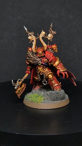 Here's a chaos Lord I completed a few months ago. I'm thinking of coming back and repainting the cape to break it up a bit mo...