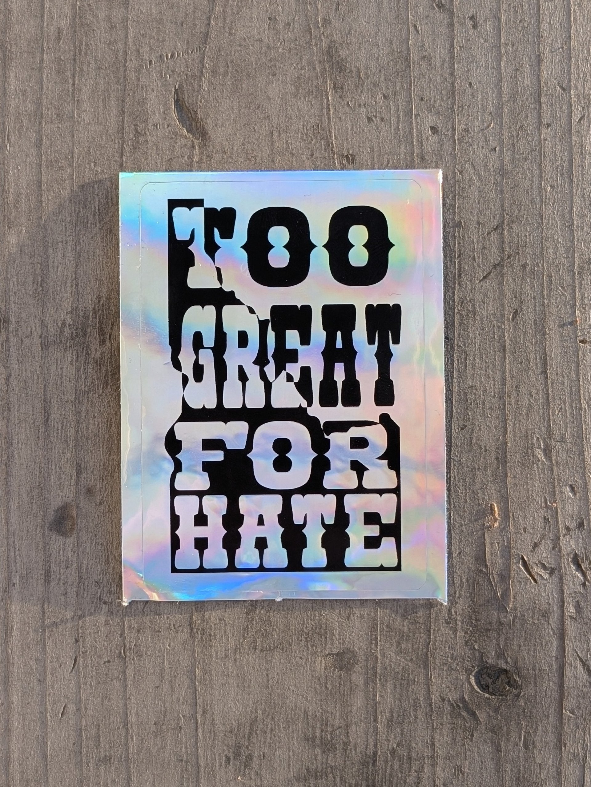 "TOO GREAT FOR HATE" holo sticker product image (1)