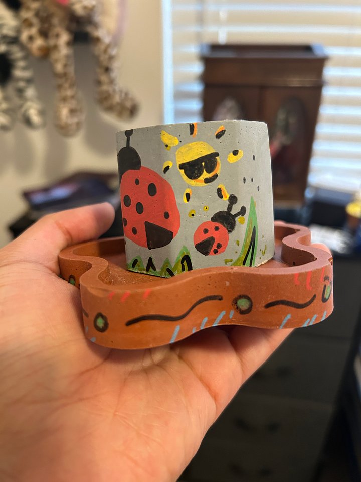 Rockin’ ladybug 1-1 original painted cement plant pot and tray product image (2)