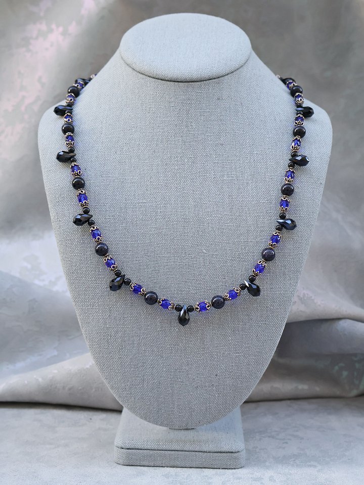 Blue Goldstone and Black Teardrop Necklace product image (1)