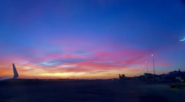 Experience the breathtaking sunset views at Faro Airport in Portugal!  Don’t forget to tap the follow button for more stunning destinations! #faro #Sunset #TravelGoals #Algarve 
