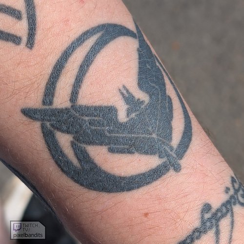 Do you have any gaming tattoos? I'd love to see! 

My first gaming one was a tribute to Elite Dangerous - without which I wou...