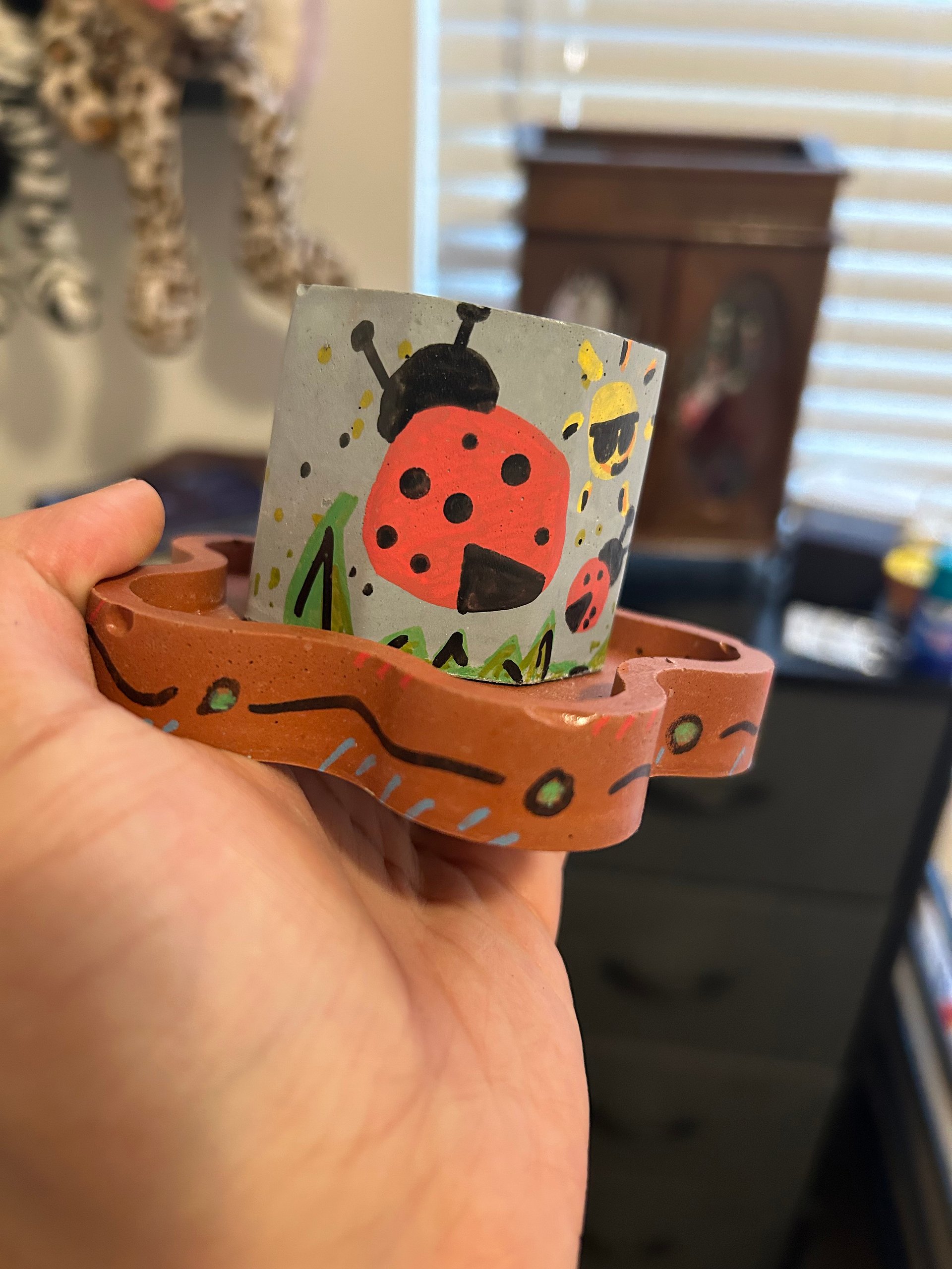 Rockin’ ladybug 1-1 original painted cement plant pot and tray product image (3)