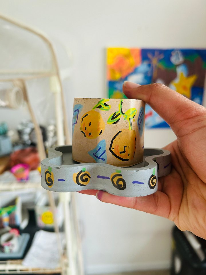 Orange you glad I didn’t say yellow 1-1 original painted cement plant pot and tray product image (1)