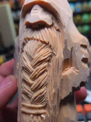 Hand carved Dwarf. Tried texturing a beard vastly different than normal with these sharp clean cuts..  its very much channeling the a bit of Chris Hammack style into my dwarves and i'm not sorry about it at all.  Loving the influence. #woodworking  #woodcarver #warcraft #lotr #fantasyartist 