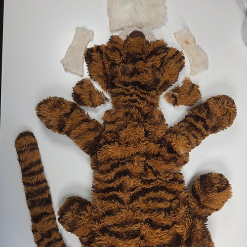Sad tiger.... Happy tiger! Tia the Tiger is feeling much better now with her beautiful face restored! She is going to stay fa...