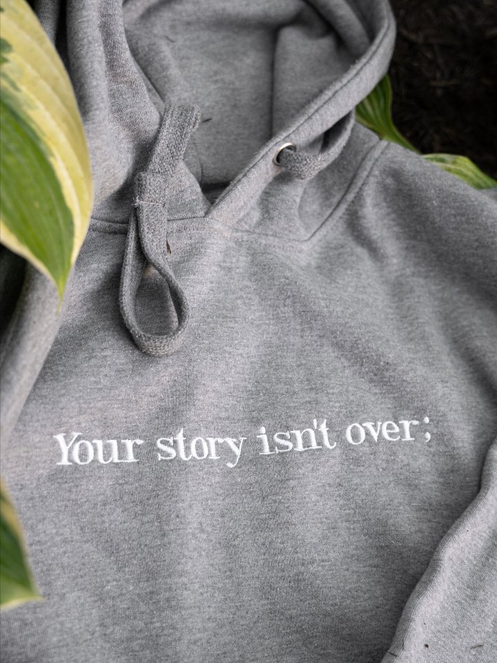 "Your story isn't over;" - Happy Hoodie (Embroidered) product image (1)