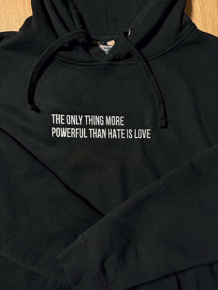 Unisex The only thing more powerful than hate is love Sweatshirt product image (1)