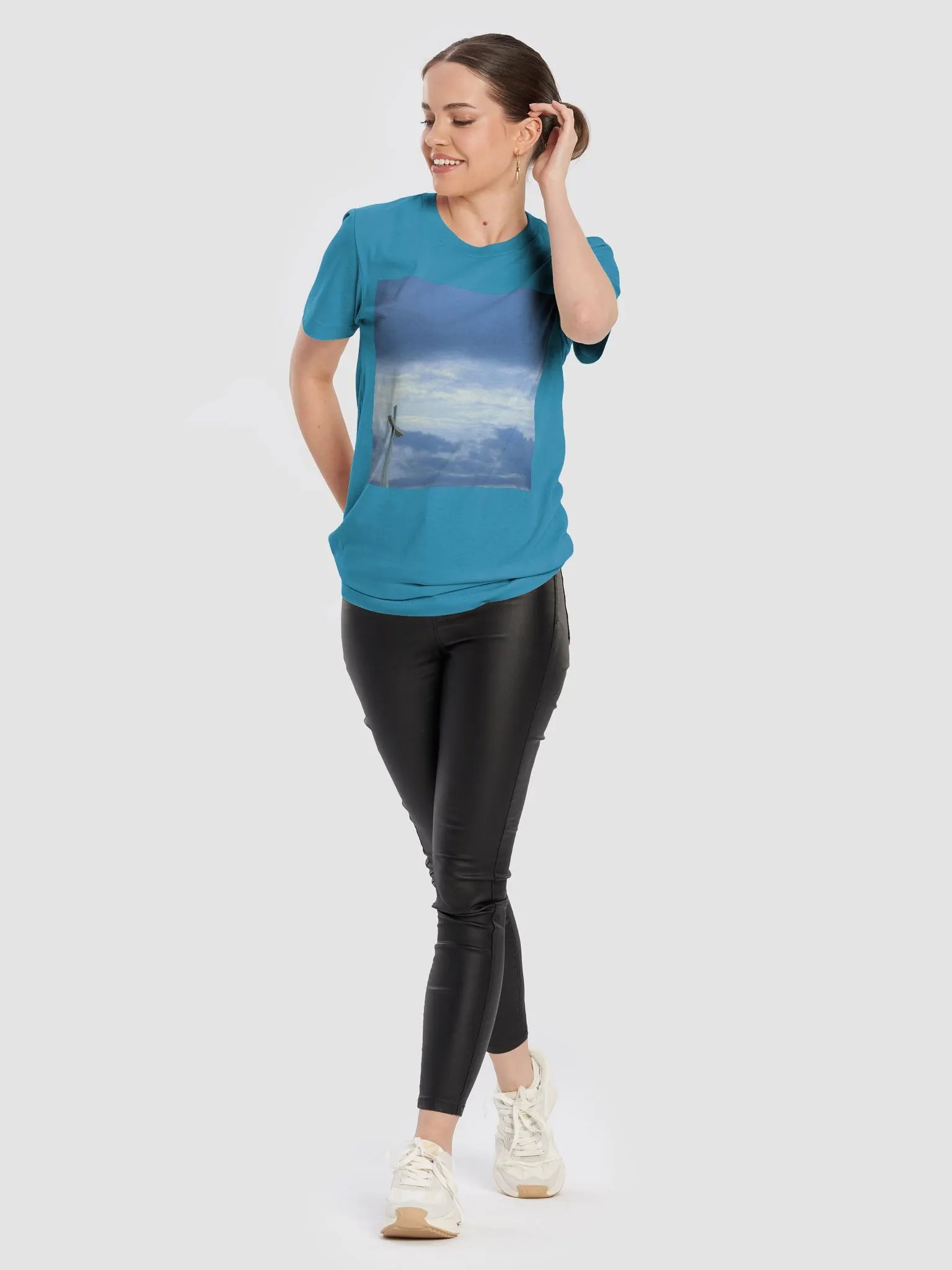 A cross standing against a dramatic sky with layers of clouds t-shirt product image (6)