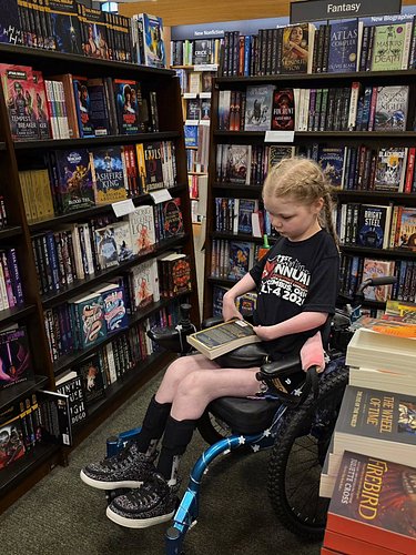 Ana's second favorite place to be! 📚 
(her first favorite place is in the pool)

Ana loves reading sci-fi and mysteries but h...