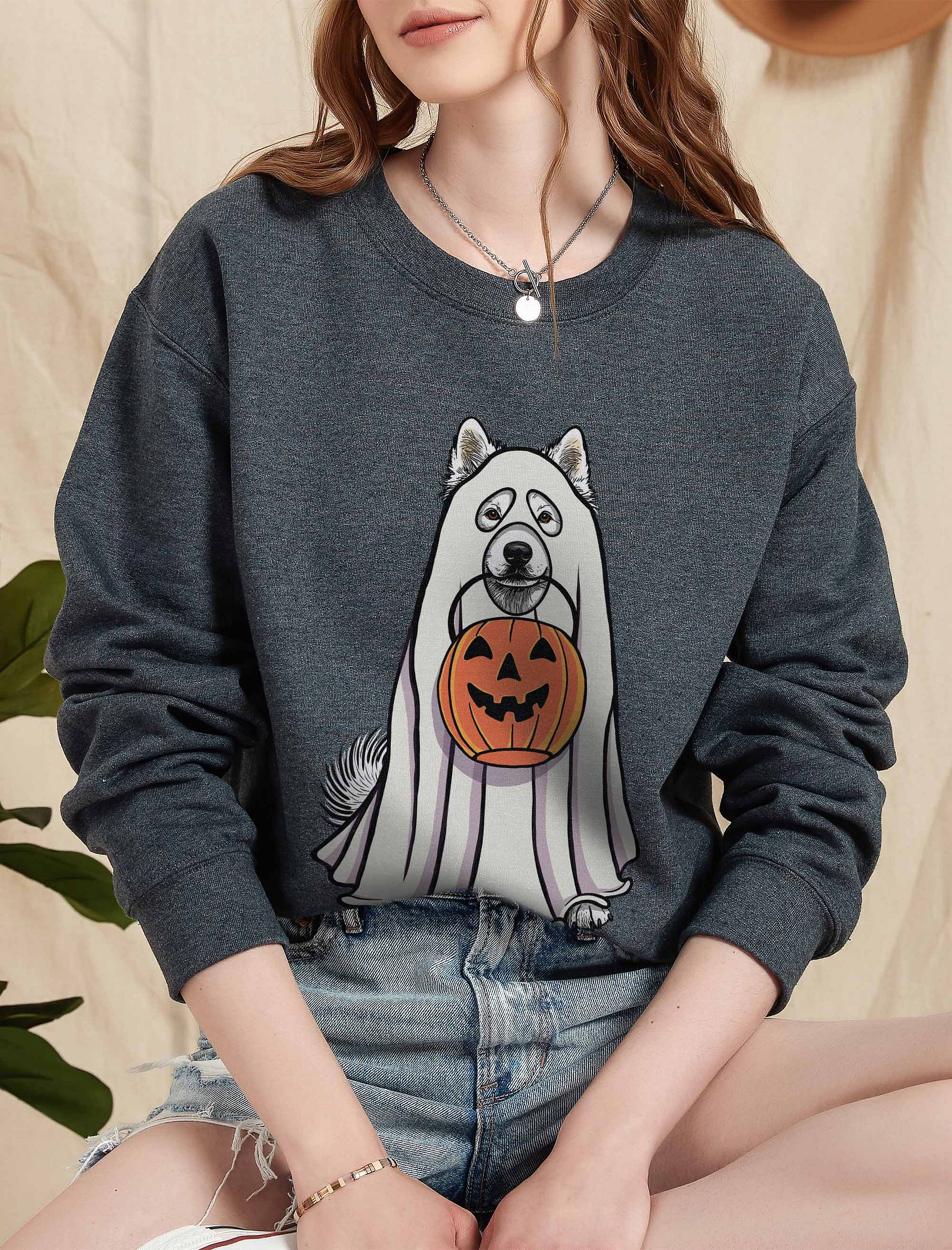 Funny Halloween Samoyed Sweatshirt | Funny Dog Wearing a Ghost Costume and Holding a Pumpkin Basket product image (2)
