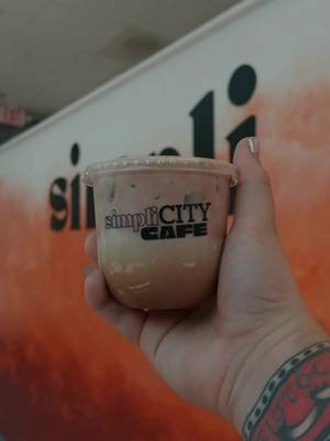 Come with me to @Simpli City Cafe, a new black owned cafe in Charlotte. You already know I’m trying the big 3, so let’s get into it.  First up we have the iced Americano. It was a darker roast that was lighter, woody, and had caramel notes right off the bat.  The Simpli Fierce is officially in the running for the best Mocha in Charlotte. It had toasted marshmellow syrup with a chocolate cold foam on top. This is a MUST TRY.  Last I tried the 90s fine matcha made with coconut water and a strawberry hibiscus syrup. This was soooo refreshing and unique.  One of the best things about Simpli City is that all their syrups are clean. I can definitely see this becoming one of my new spots.  #coffee #cltcoffee #charlottecoffee #coffeelover #cltcoffeecommunity @Marian| CLT Cafe Owner & SAHM 