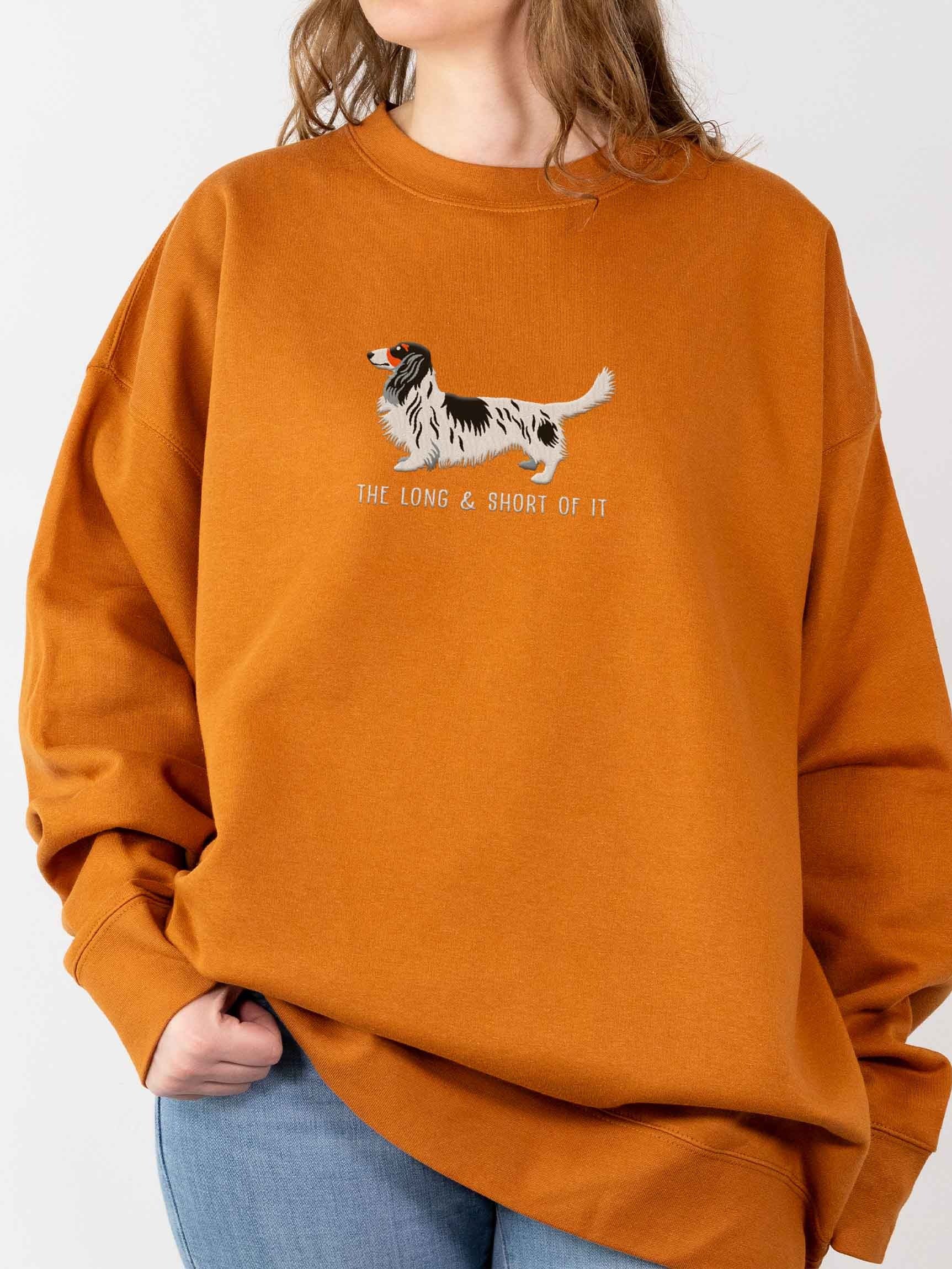 The Long & Short of It Sweatshirt (Embroidered) of a Longhaired Dachshund(Pied Black & White) product image (2)