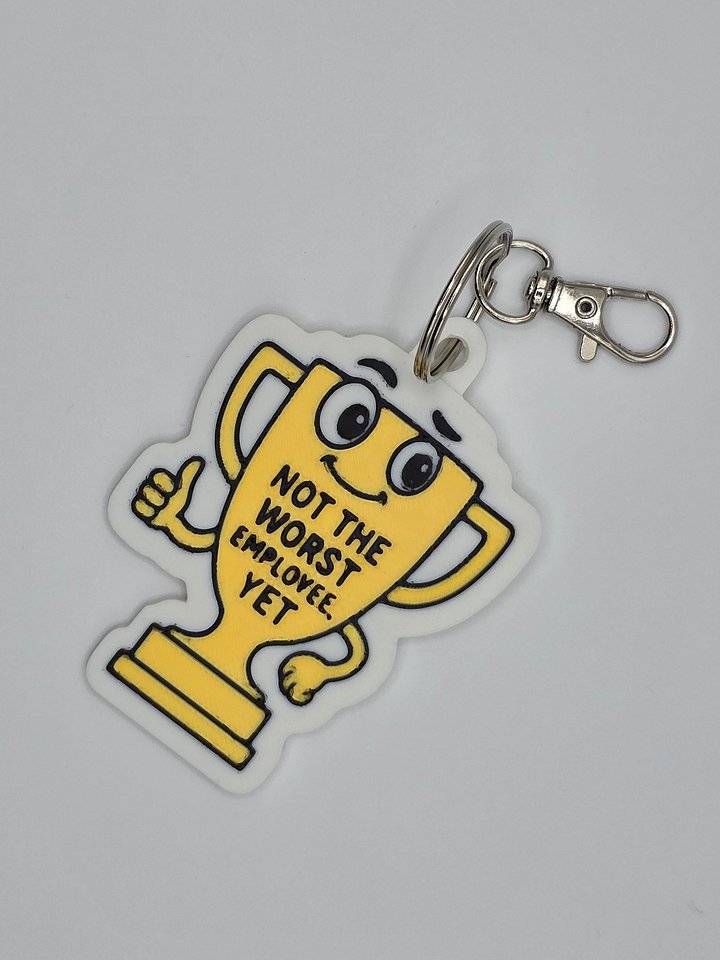 🏆 “Not the Worst Employee, Yet” Trophy Keychain product image (2)