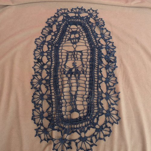 My blocking skills could use some work, but skelly lace! I used @wecrochetofficial Curio 10 thread and the pattern is Postmor...