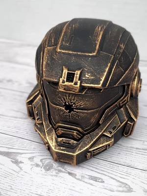 A helmet left behind. 🪖 Inspired by the final scene of Halo: Reach, this Noble Six helmet represents the aftermath of Noble Six’s final stand. The gunshot through the visor is the detail that makes this piece instantly recognizable. 💥 3D printed in PLA, then primed, sanded, painted flat black, and hand-finished with professional gilding wax in an antique gold tone to create that worn, battle-scarred metal look. Approx. 4” × 6” × 4”. Some battles leave more than scars behind. #Halo #HaloReach #NobleSix #3DPrinting #Gaming