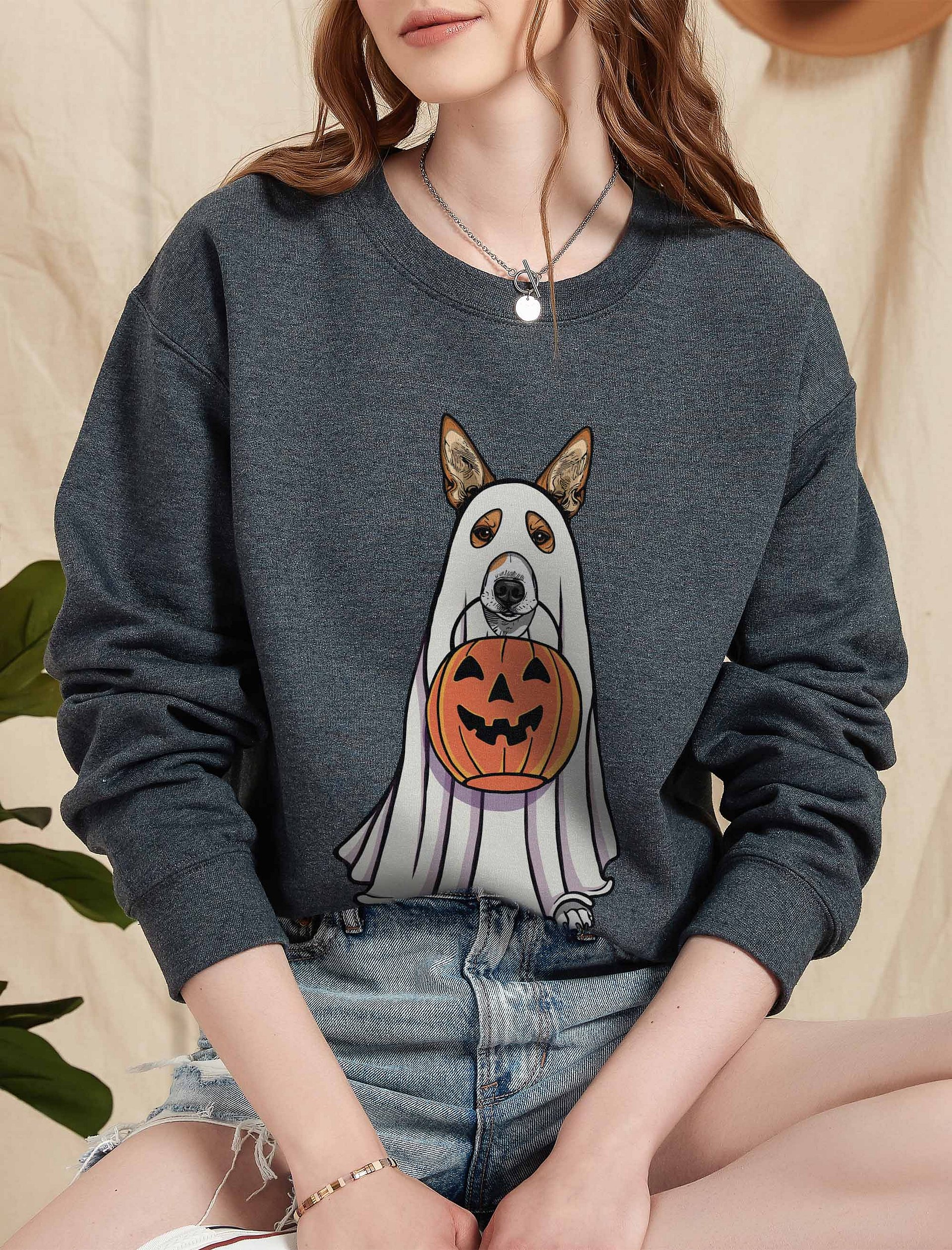 Funny Halloween Basenji(2) Sweatshirt | Funny Basenji Wearing a Ghost Costume and Holding a Pumpkin Basket product image (2)