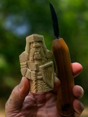 Carving a wooden shield on a Dwarve.  Basswood, 3inches tall 1.5x1.5.  Tools used, 2inch knife and number 12, 3mm v tool varying the depth of the push to elicit different textures. Also a large V tool for putting deep cuts on the interior shape or the shield. #woodcarving #tutorial #asmrvideo #fantasyart #fantasyartwork 