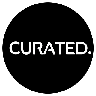 CURATED.