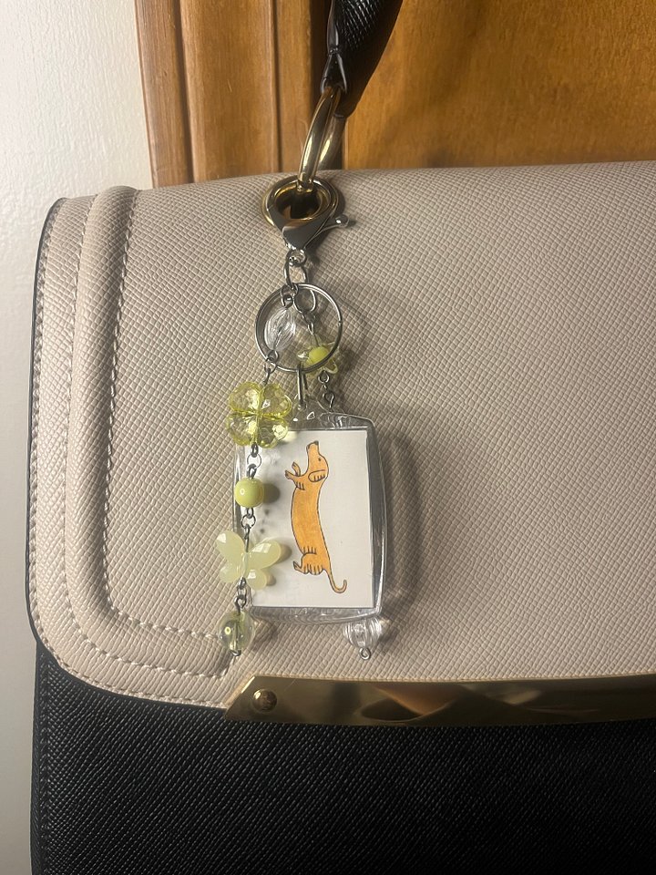 Two Yellow Dogs Deluxe Bag Charm product image (1)