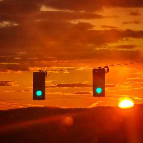 Light relinquishes  to the darkness on the edge of town..