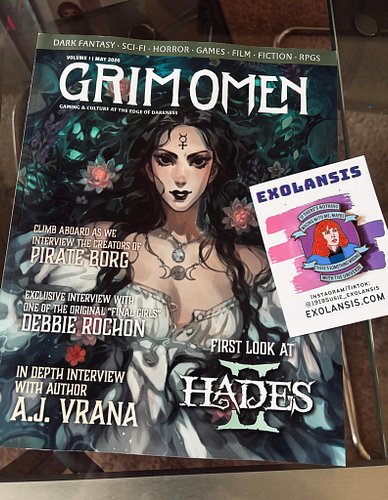 Got some fun mail. The first issue of Grim Omen magazine as well as my new favorite pin!