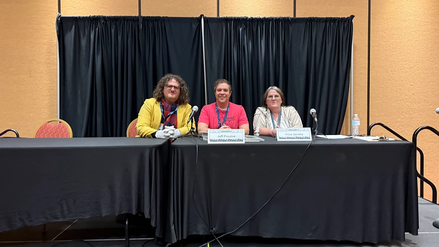 Photo of Dennis with panelists at Soonercon.