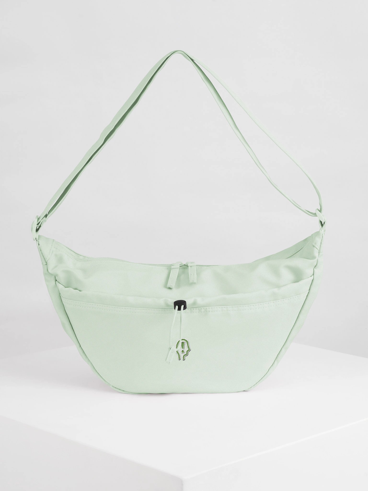 MENTALLY EXCLAIMING (green outline) sling bag product image (1)