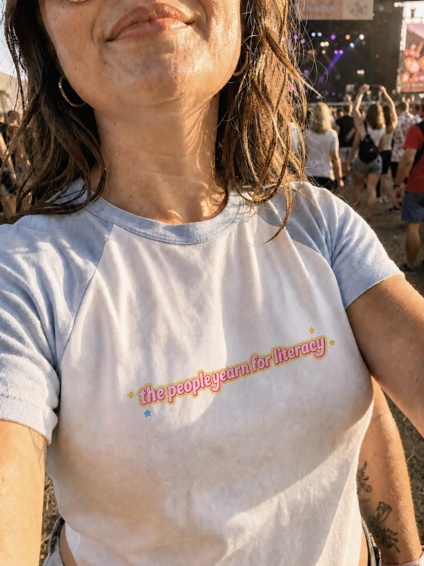 the people yearn for literacy baby tee product image (1)