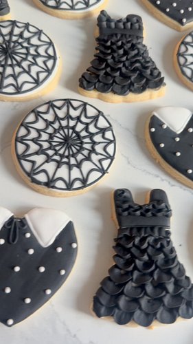 Dark, sweet, and a little mysterious — just like Wednesday 💀🖤 These hand-decorated sugar cookies are inspired by her gothic c...
