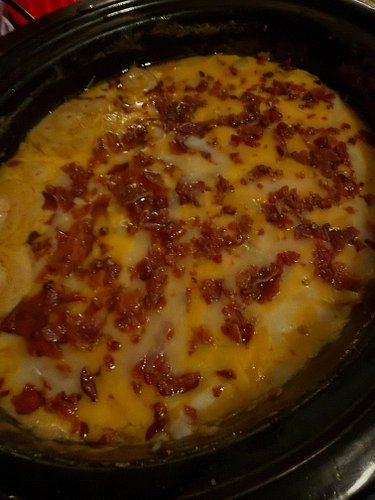 And it’s done. That nice layer of melted cheese and bacon! 

Cory’s Steakhouse Cowboy Potatoes, made with three pounds of lit...