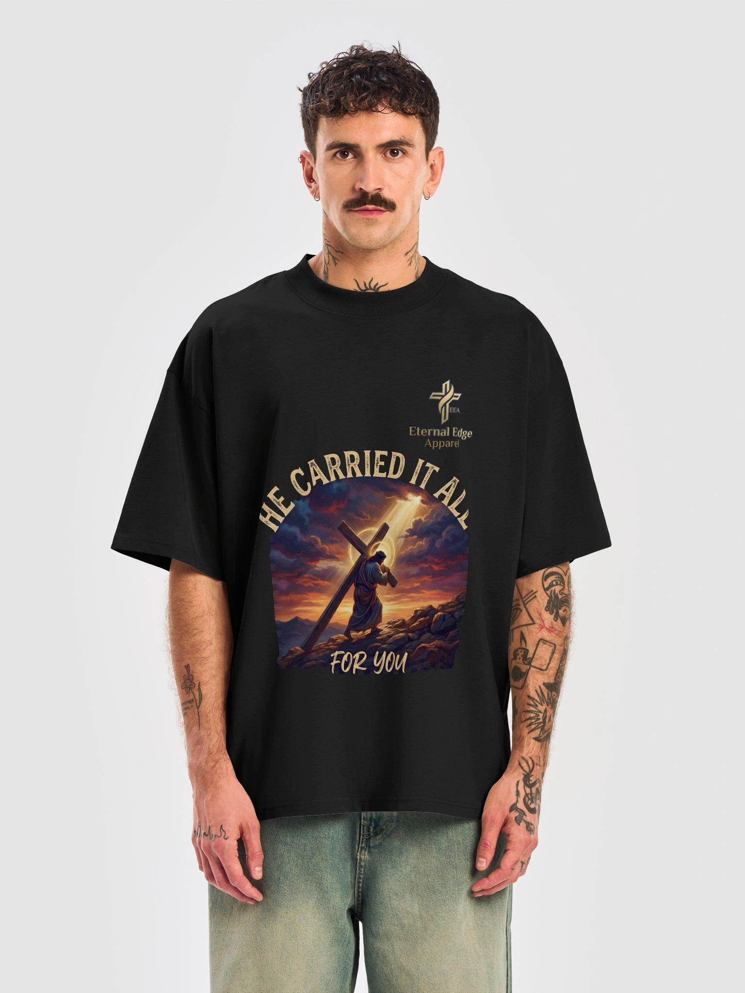 Honor the cross He carried with the He Carried It All Christian t-shirt — organic heavyweight cotton, oversized fit. Shop Eternal Edge Apparel. product image (22)