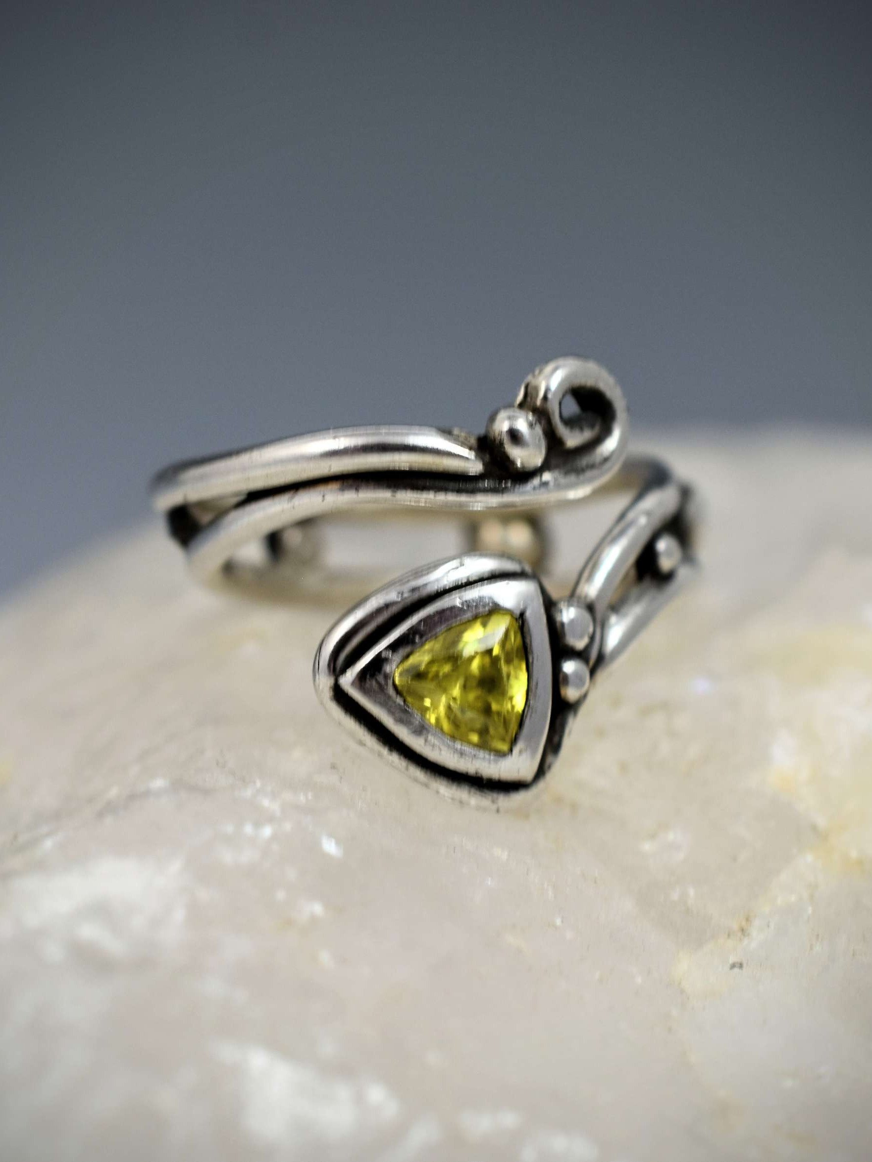 Sterling Silver Triangular Green CZ Ring – Bold Elegance in Motion product image (1)