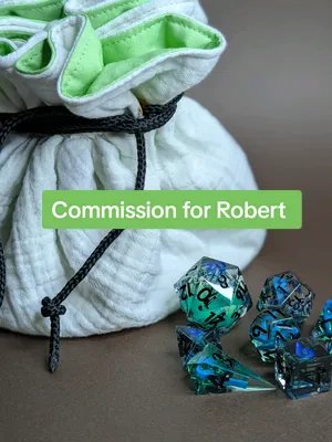 Thank you Robert for letting us bring your character to life.  I hope you love them. The bag is handmade, like all our dice bags and comes with many pockets to house so many dice.  The dice include, liquid core, hand painted Dice blanks, 3D modelled and printed inserts, and glow in the dark elements. If you'd like your own custom Dice or dice bag send me a message or fill out the contact form on our website.  www.bathyallabs.com 