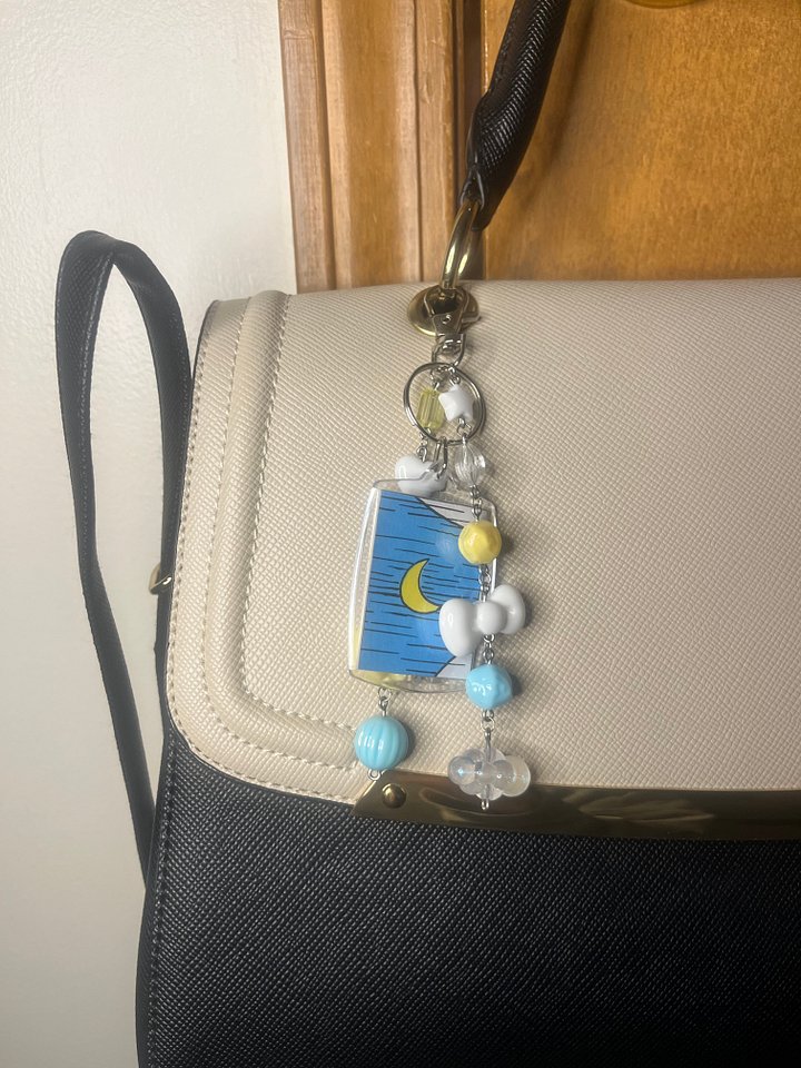 A Cloudy Sky In Thneedville Deluxe Bag Charm product image (1)