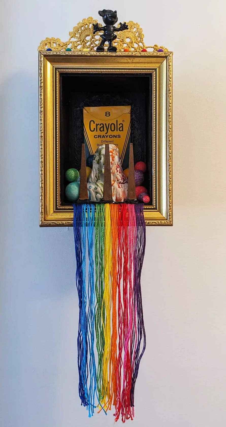 Deliver Us From Evil 2024, 11 x 7 x 4 in. Shadowbox, intaglio, clay, found objects