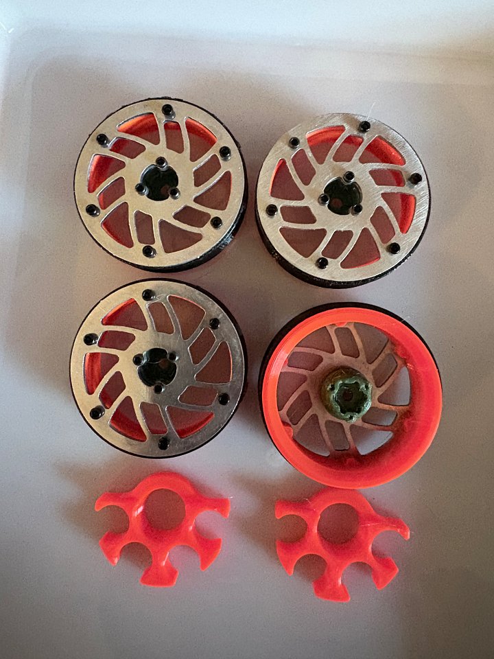 of 1.7" ( 44MM) High Clearance Wheels: "Vortex" (Safety Orange/ Forest Green) product image (1)