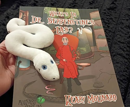 I bought a signed copy of the book from The Molinaro Snake Lab, and he sent all of the kids their own blue eyed Lucy plushie ...