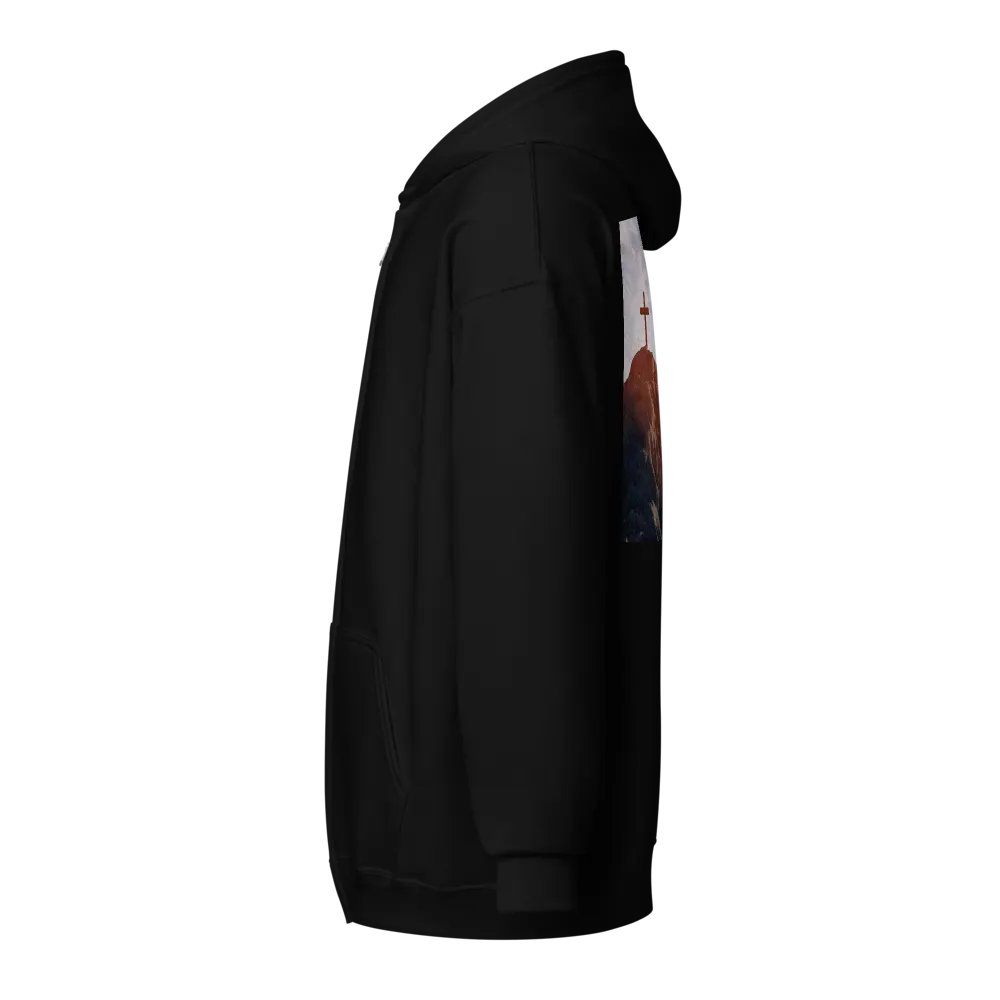 Wooden cross standing atop a rocky hill or mountain, under a sky filled with soft clouds and warm sunlight Hoodie product image (3)