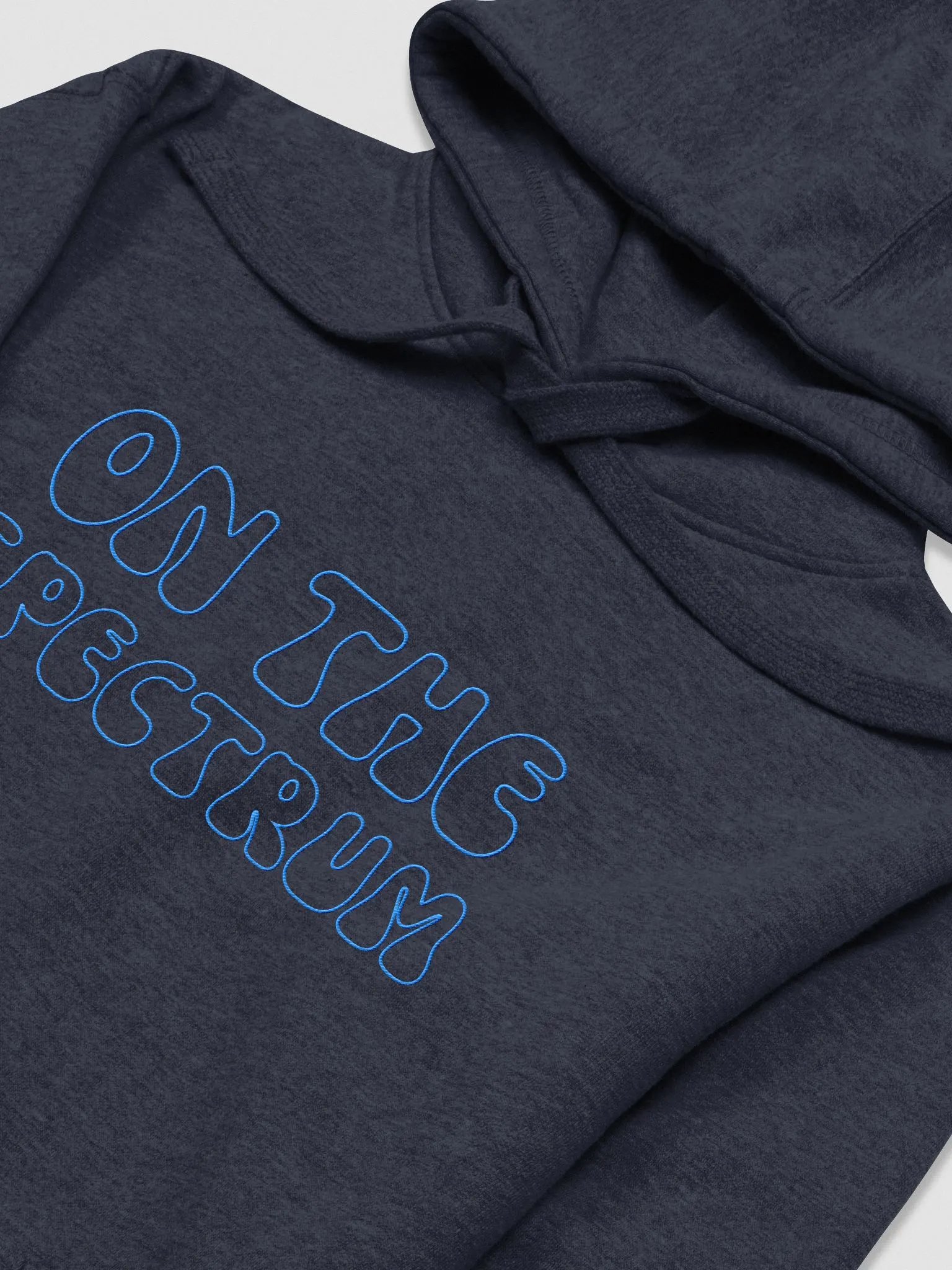 ON THE SPECTRUM OUTLINE (lg. design, aqua thread) embroidered heavyweight hoodie product image (11)