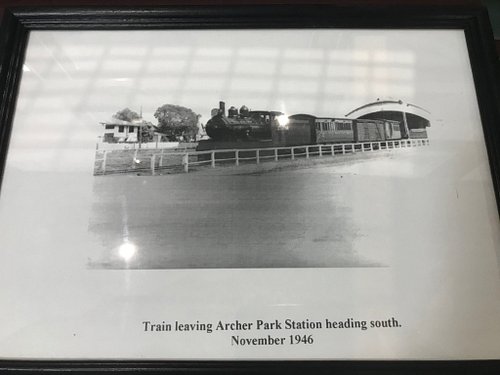 In this particular photograph, is a train leaving Archer Park Railway Station heading south. The original photograph was take...