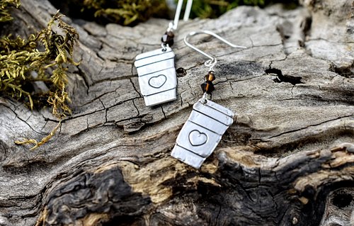If you can’t imagine a day without their coffee, these adorable sterling silver earrings are the perfect tribute to your dail...